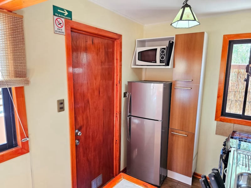 Kitchen with refrigerator