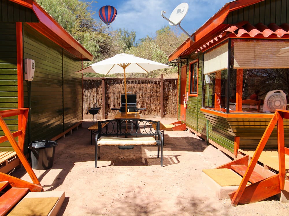 Patio with BBQ area and parasol