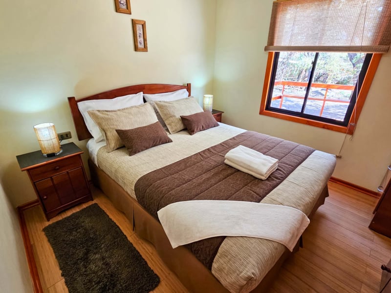 Main bedroom of the Elite Bungalow with pool view