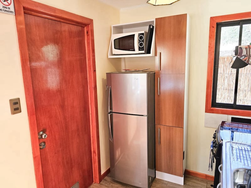 Kitchen with refrigerator