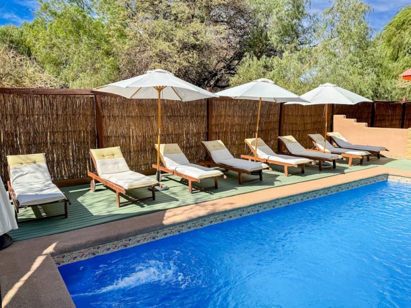 Pool with sun loungers