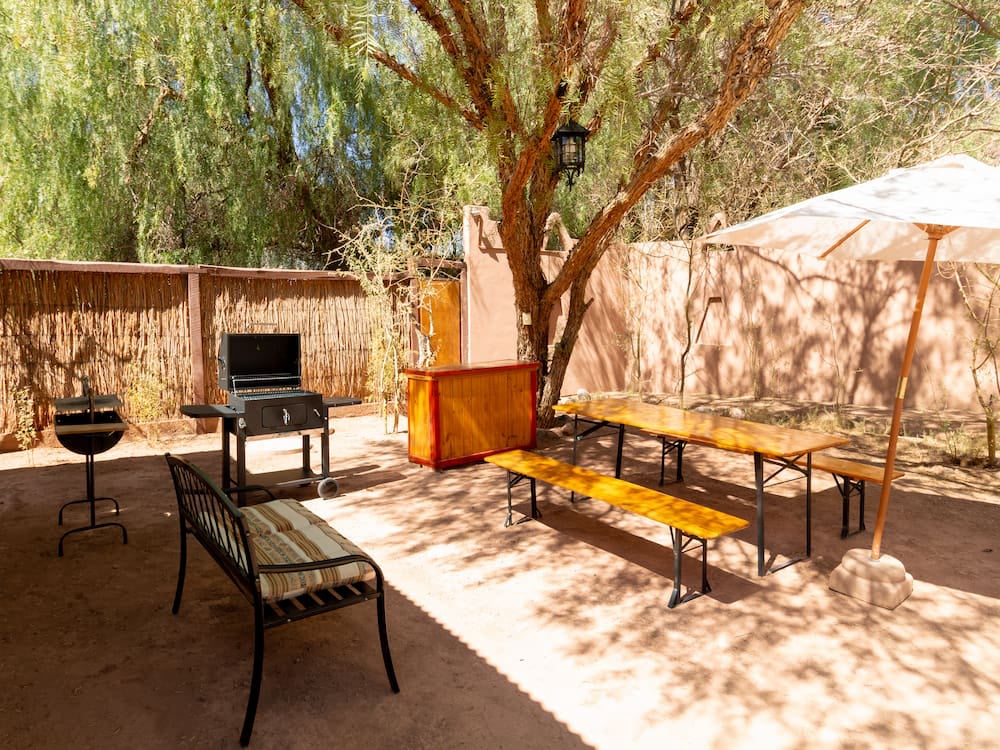 BBQ area with grill and tables