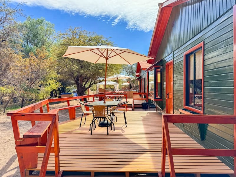 Wooden terrace with parasol