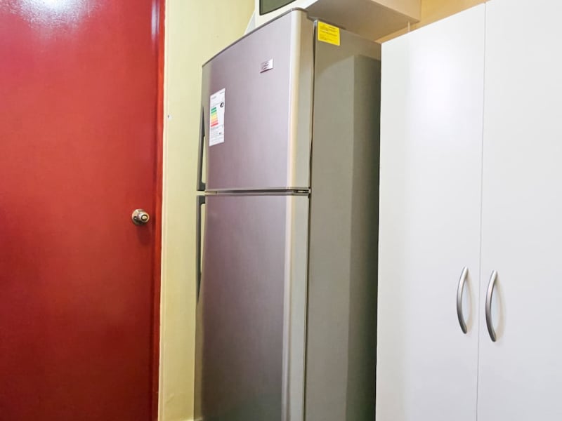 Kitchen with refrigerator