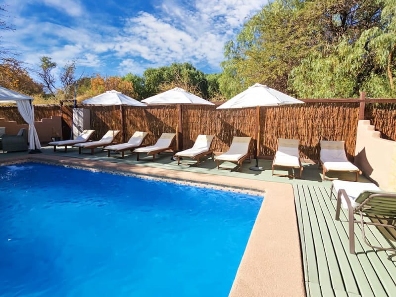Pool with sun loungers