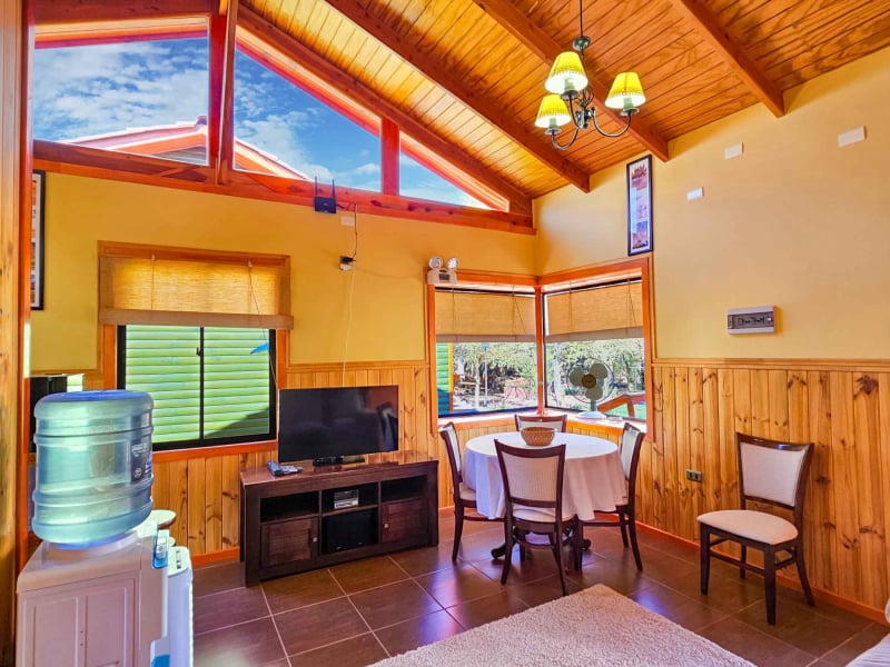 Living room with picture window, Superior Bungalow with garden view