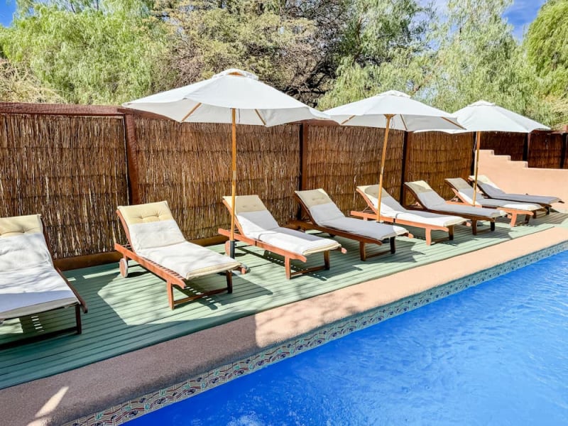Pool with sun loungers