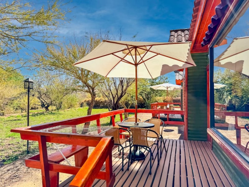 Wooden terrace with parasol