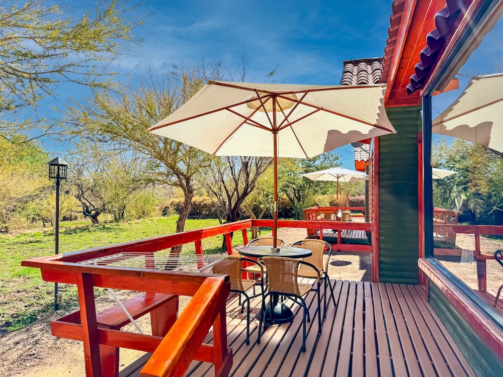 Wooden terrace with parasol