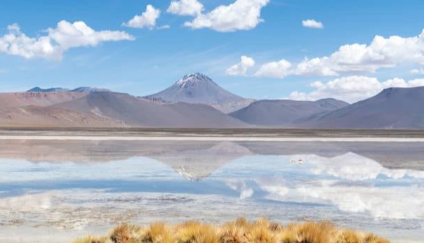 Volcano reflected in the Salar de Aguas Calientes