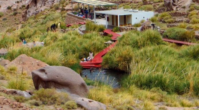 Thermal pools and wooden walkways at Termas de Puritama